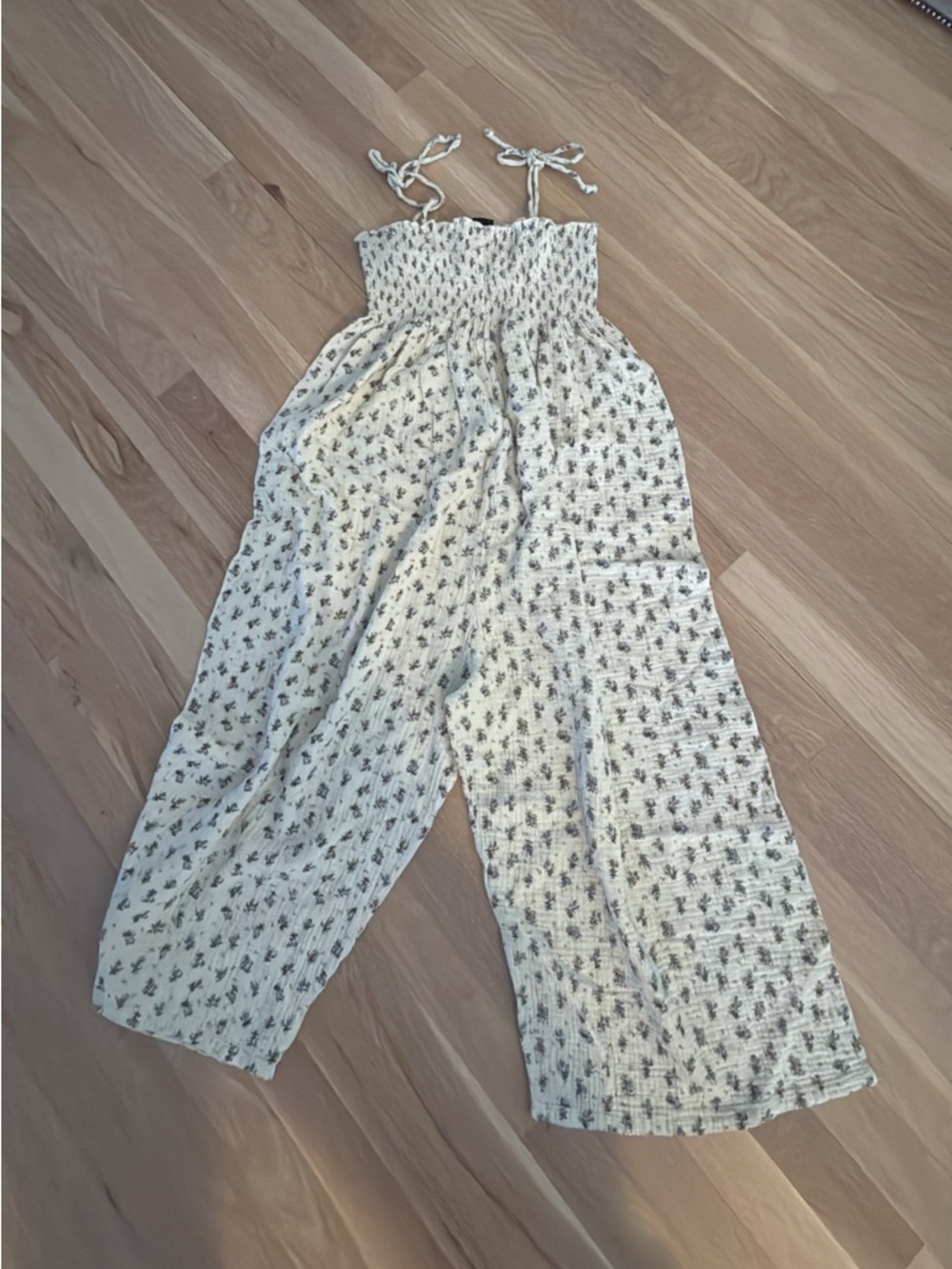 Vici Cream Floral Smocked Wide-Leg Romper with Tie Straps